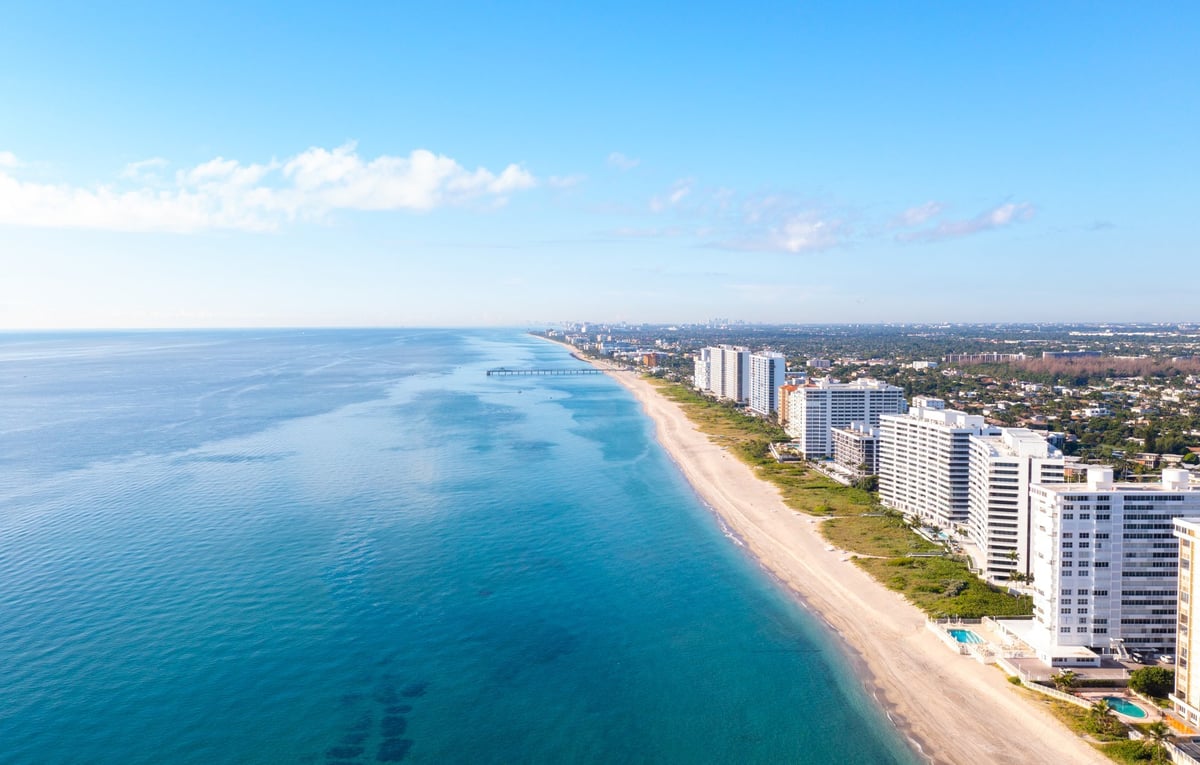 Aerial coastline view of upscale oceanfront homes