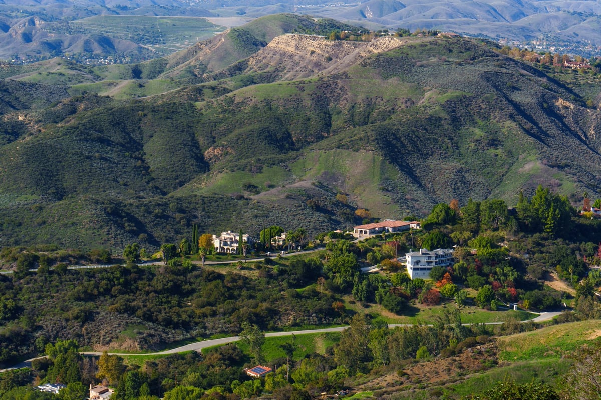 Grand upscale residences set into rolling hills
